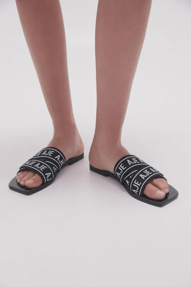 Cosmos Logo Slide Black Women Aje Shoes
