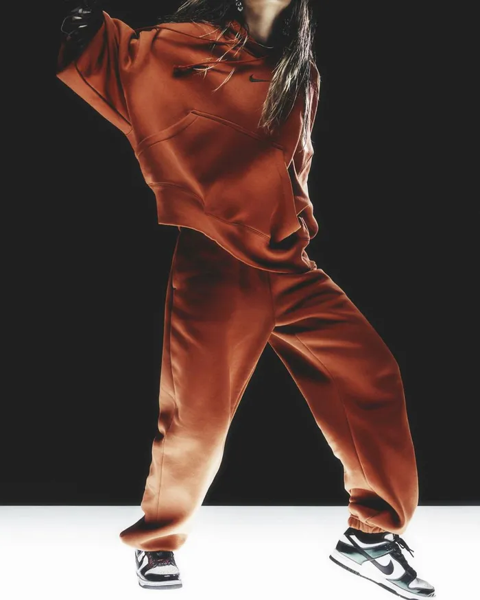 Women Nike Trousers Sportswear Phoenix Fleece Rugged Orangeblack