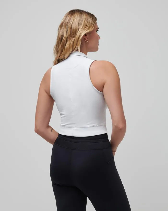 Women Polos TravisMathew MOVEKNIT SLEEVELESS VNECK POLO White Women Polos TravisMathew MOVEKNIT SLEEVELESS VNECK POLO White